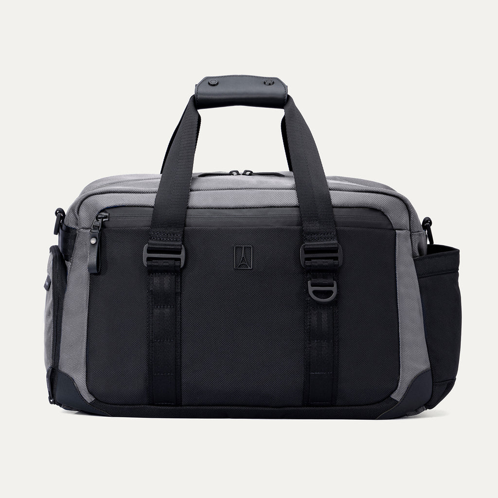 Front view of the Travelpro Altitude Day-to-Day Duffel in Falcon Grey, showing structured handles and front compression straps.
