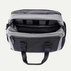Top view of the Travelpro Altitude Day-to-Day Duffel in Falcon Grey, showing interior organizational compartments and padded laptop sleeve.
