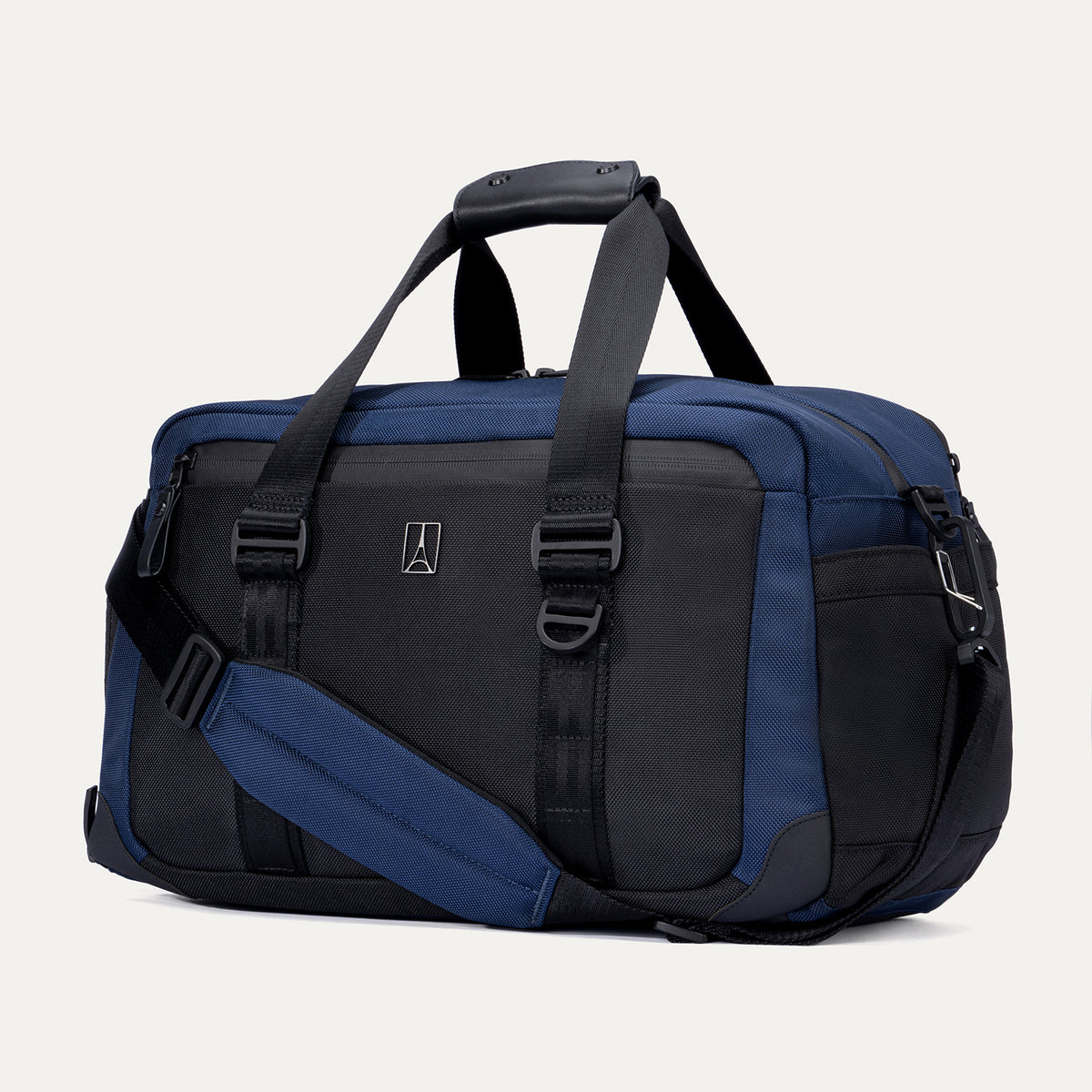 Front view of the Travelpro Altitude Day-to-Day Duffel in Aviator Navy, showcasing dual carry handles and secure front zip compartment.
