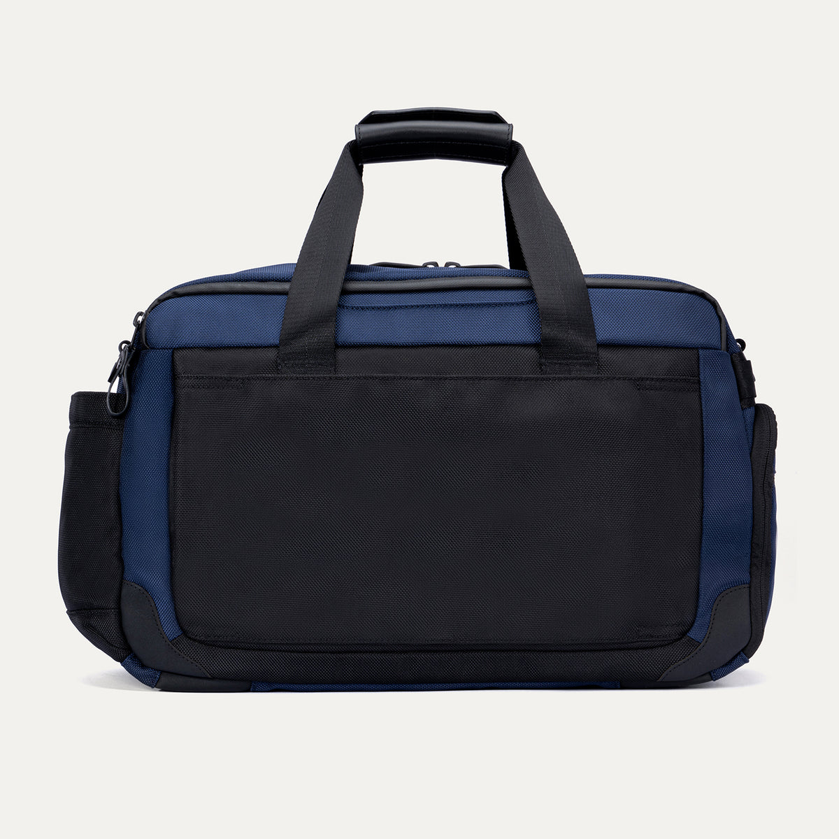 Rear view of the Travelpro Altitude Day-to-Day Duffel in Aviator Navy, featuring a large back panel pocket for secure storage.


