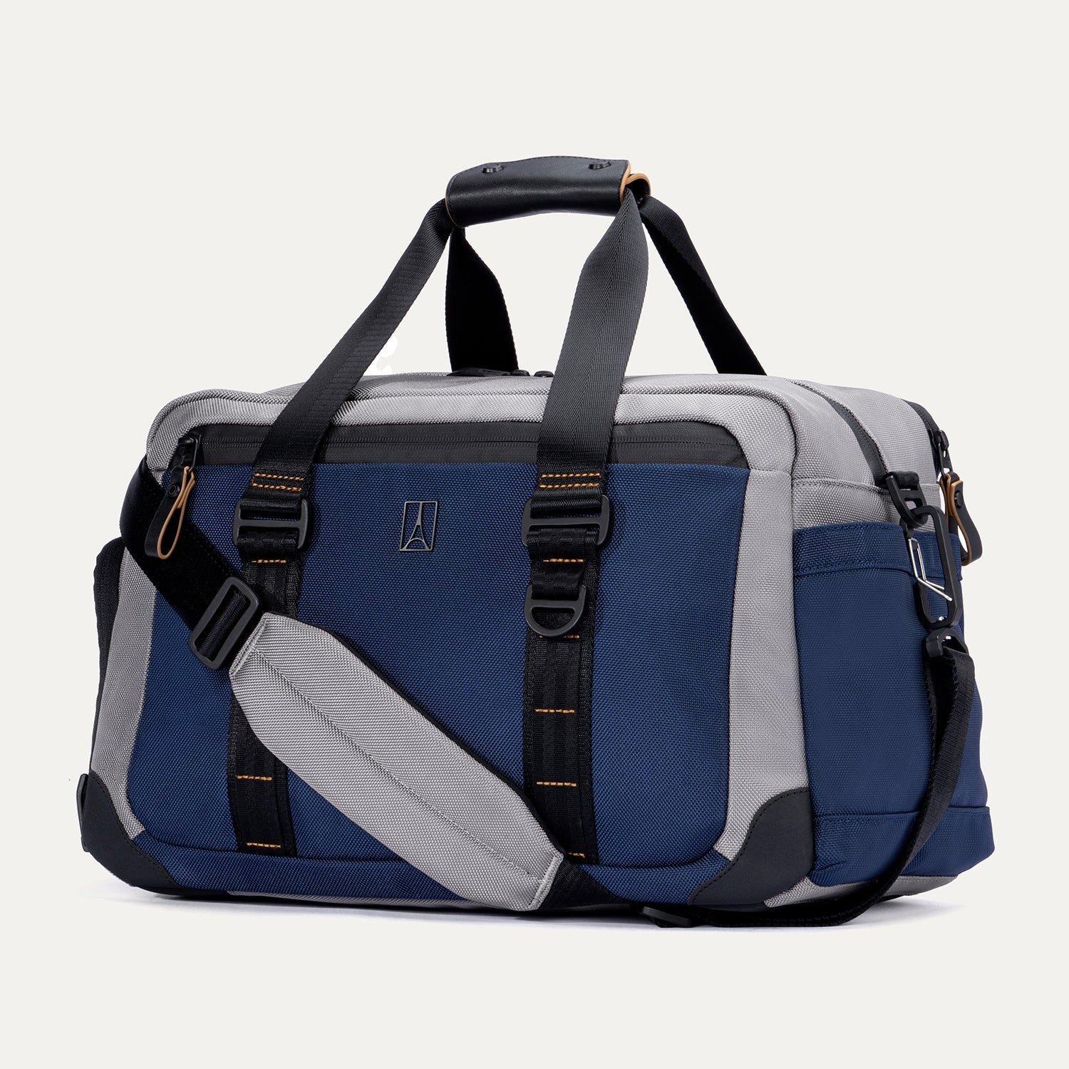 Travelpro Altitude Day-to-Day Duffel in Stellar Navy/Grey, featuring reinforced carry handles and adjustable shoulder strap.
