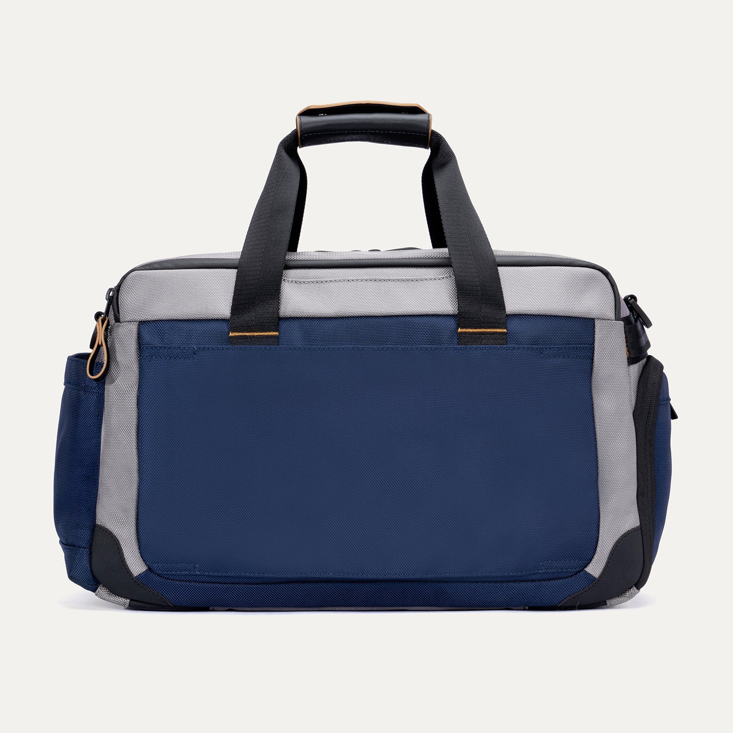 Rear view of the Travelpro Altitude Day-to-Day Duffel in Stellar Navy/Grey, showing rear pocket and dual carry handles.

