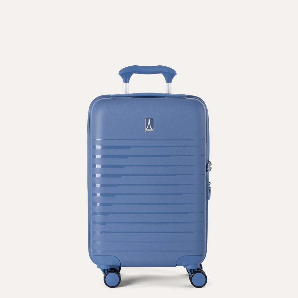 Front view of the Optima Expandable Compact Carry-on Spinner in Horizon Blue, showcasing the durable polypropylene hardshell with sleek horizontal ribbing, centered Travelpro logo, and telescoping handle.