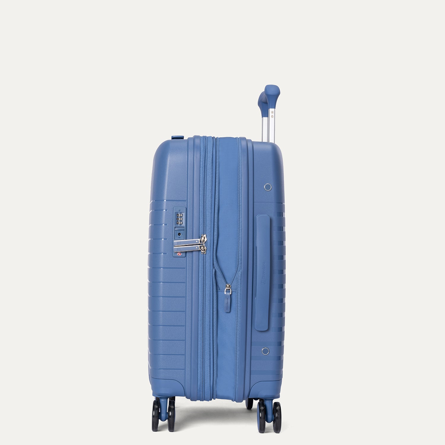 Blue suitcase on a light gray background