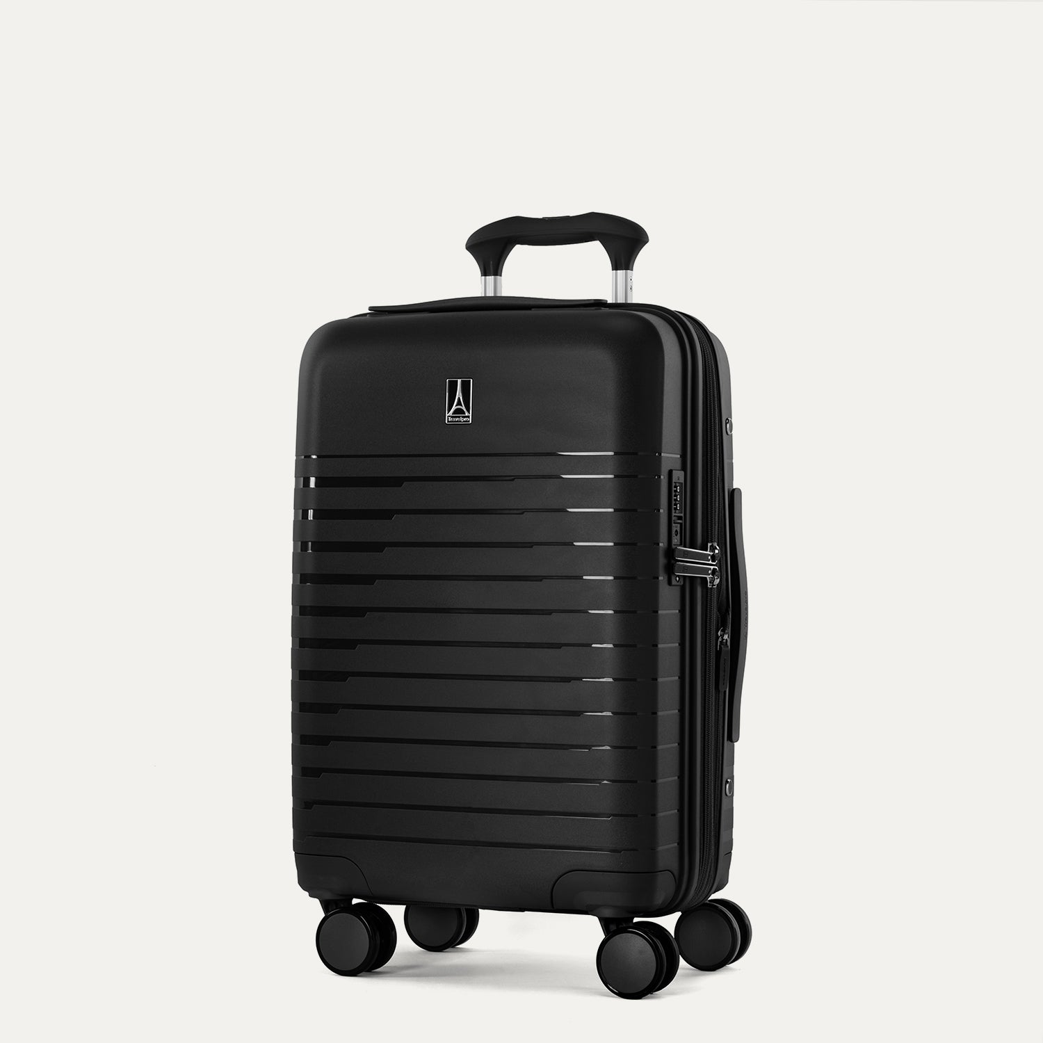 Black suitcase with wheels on a light gray background