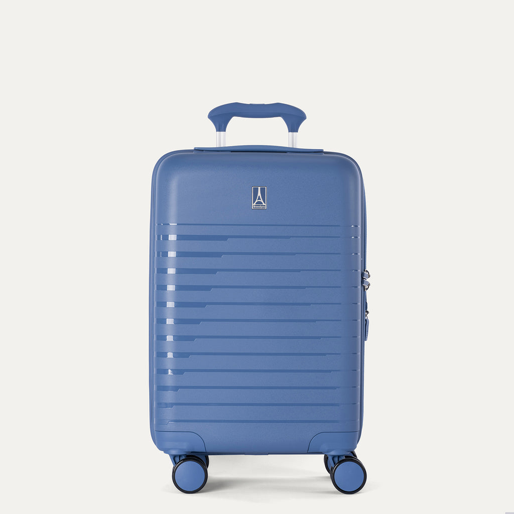 Front view of the Horizon Blue Optima Expandable Carry-on Spinner, showcasing the durable polypropylene shell with horizontal ribbing and a color-matched telescoping handle against a light gray background.