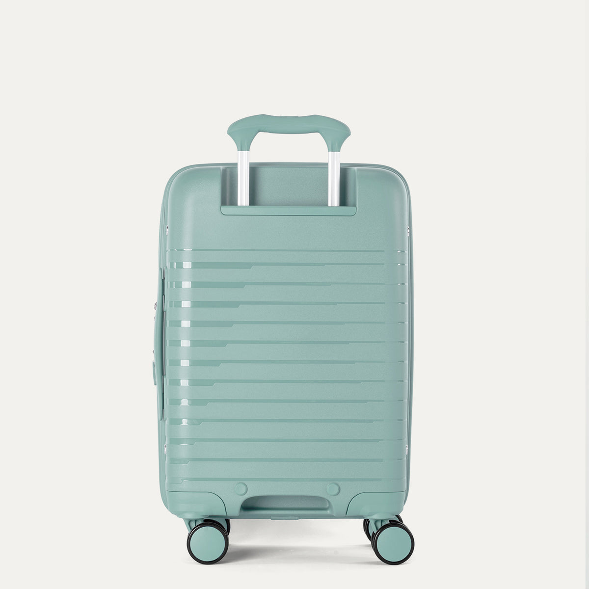 Front-facing view of the Optima Expandable Carry-on Spinner in Lunar Rock, showing the upright hardshell suitcase with horizontal ribbed detailing, an extended telescoping handle, top carry handle, and smooth-rolling multi-directional wheels against a solid off-white background.
