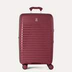 Red suitcase with a visible brand logo on a light gray background