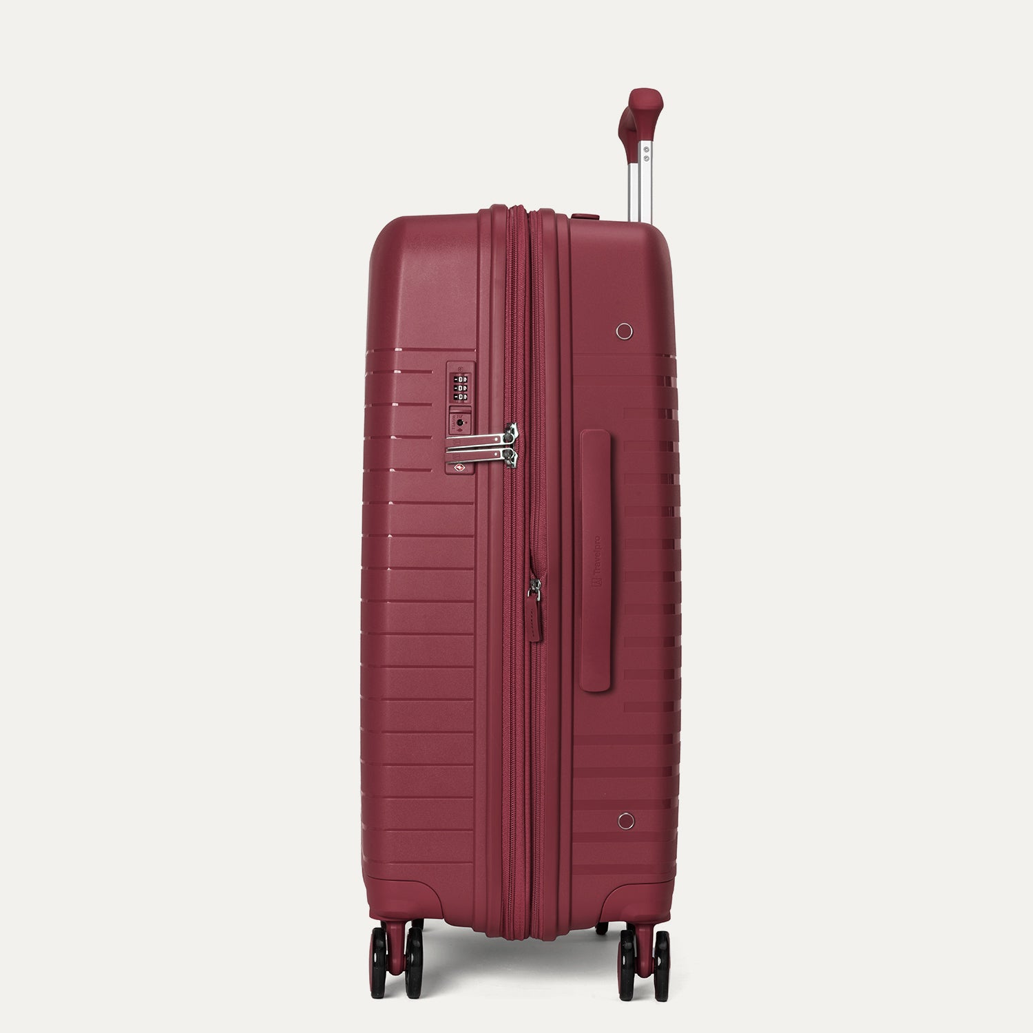 Maroon suitcase with wheels and handle on a light gray background