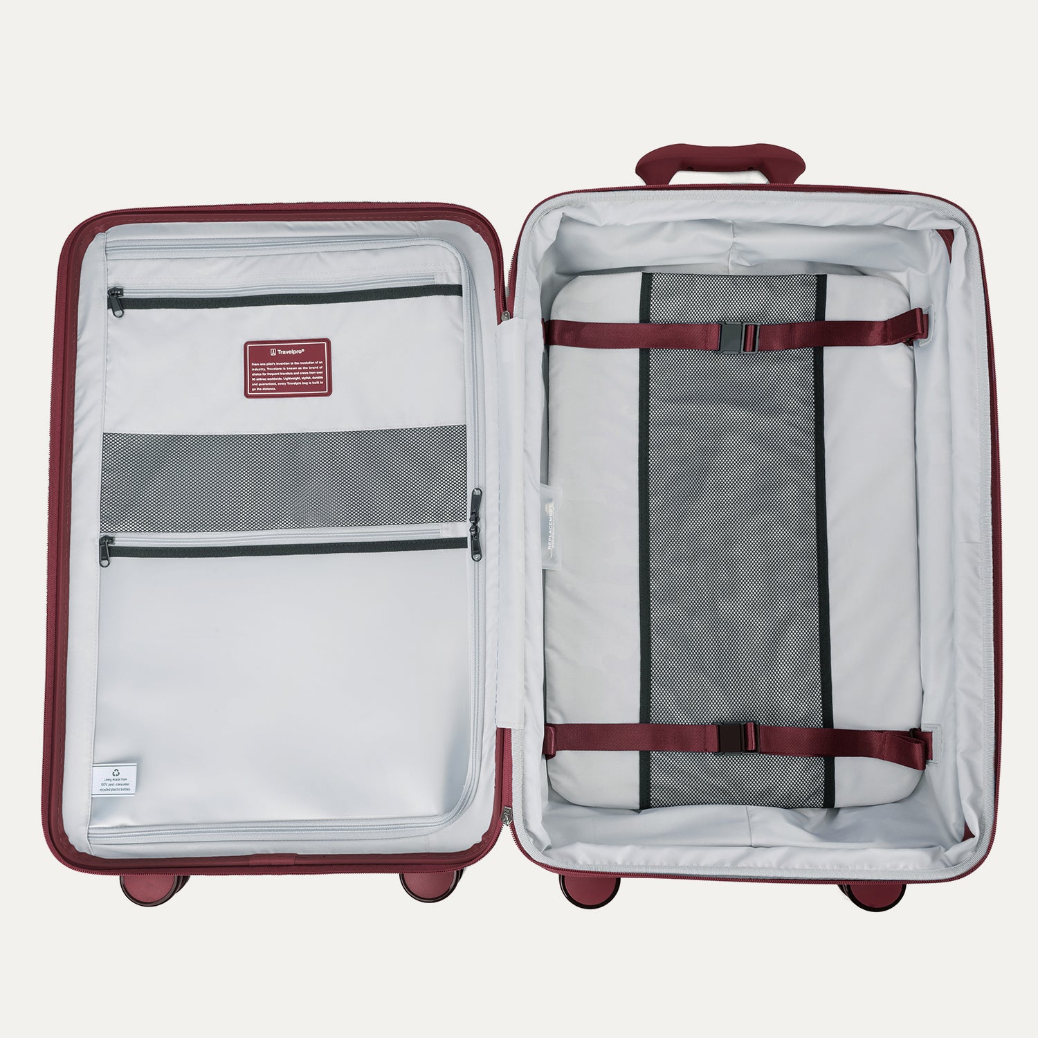 Open suitcase with interior organization panels on a white background