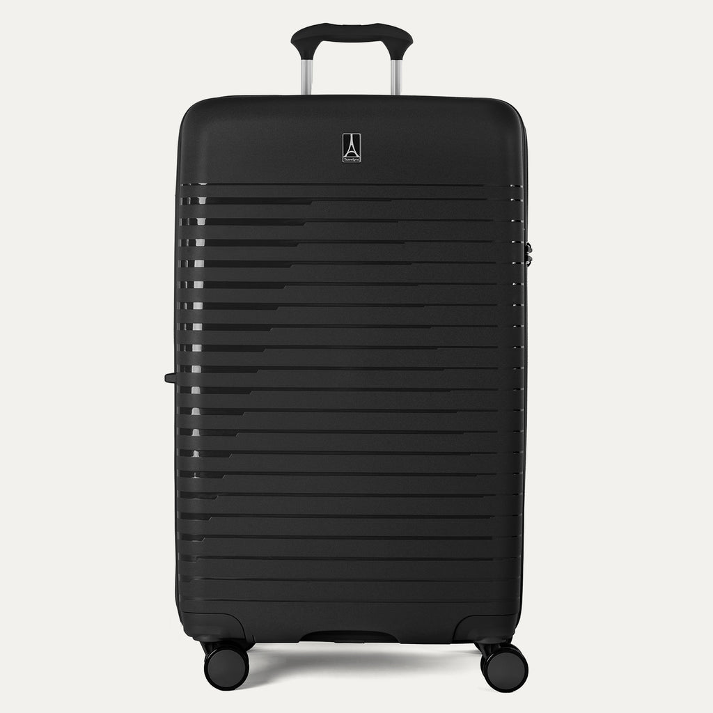 Black suitcase with a textured surface on a white background