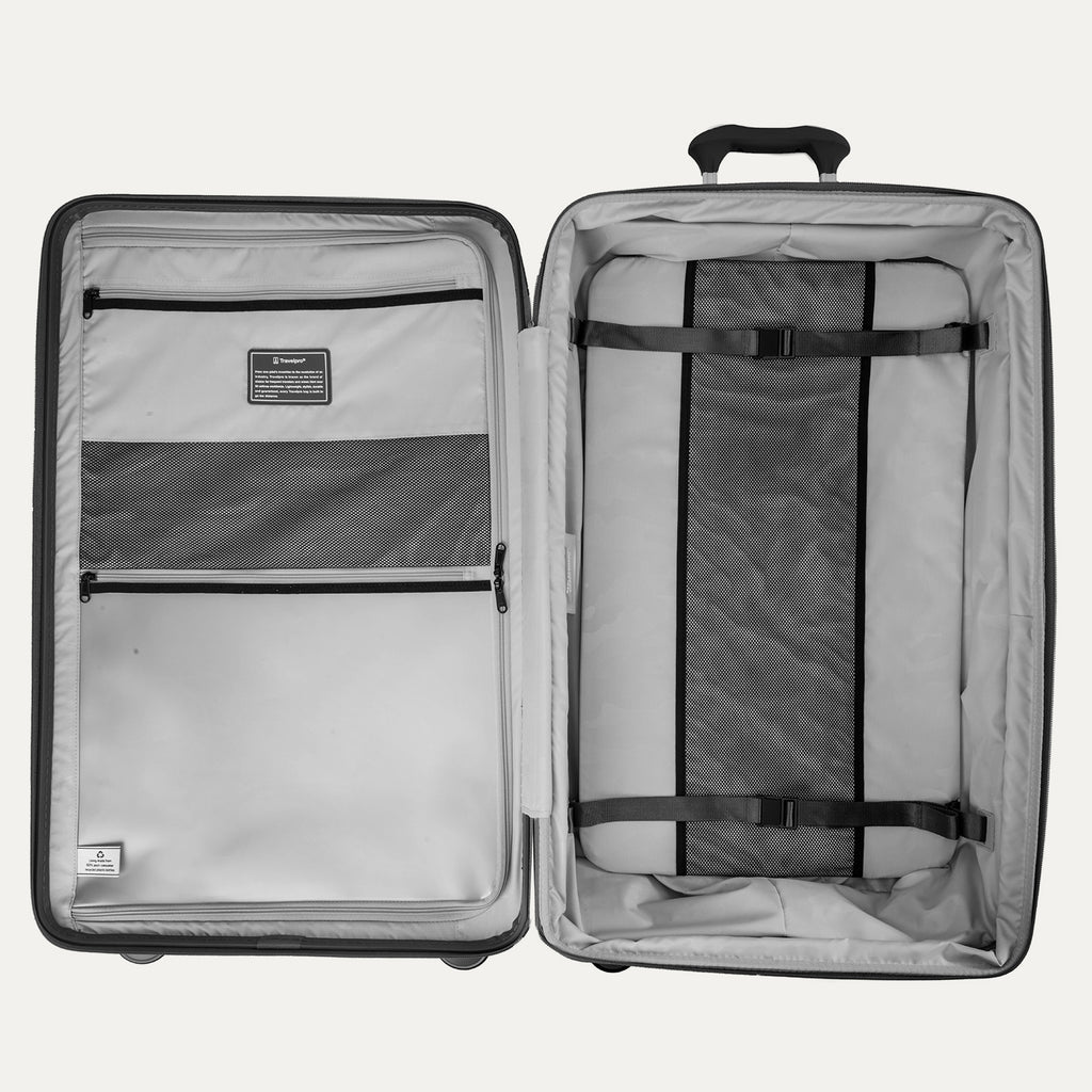 Open gray suitcase with interior organization panels on a white background