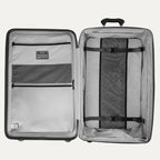 Open gray suitcase with interior organization panels on a white background