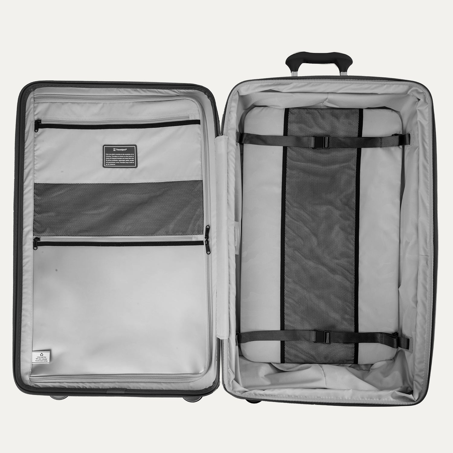 Open gray suitcase with interior organization panels on a white background