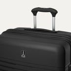 Black suitcase with a visible brand logo on a light gray background