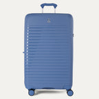 Blue suitcase with a visible brand logo on a light gray background