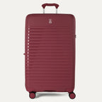 Red suitcase with a visible brand logo on a white background