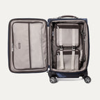 Interior of Travelpro Platinum Elite Carry-On Spinner in camouflage, featuring organizational compartments and compression straps.
