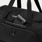 Black weekender with phone in QuickSlip™ pocket, featuring the Travelpro logo