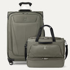 Green suitcase and weekender bag with visible brand logo on a white background