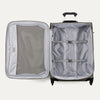 Open suitcase with interior compartments on a white background