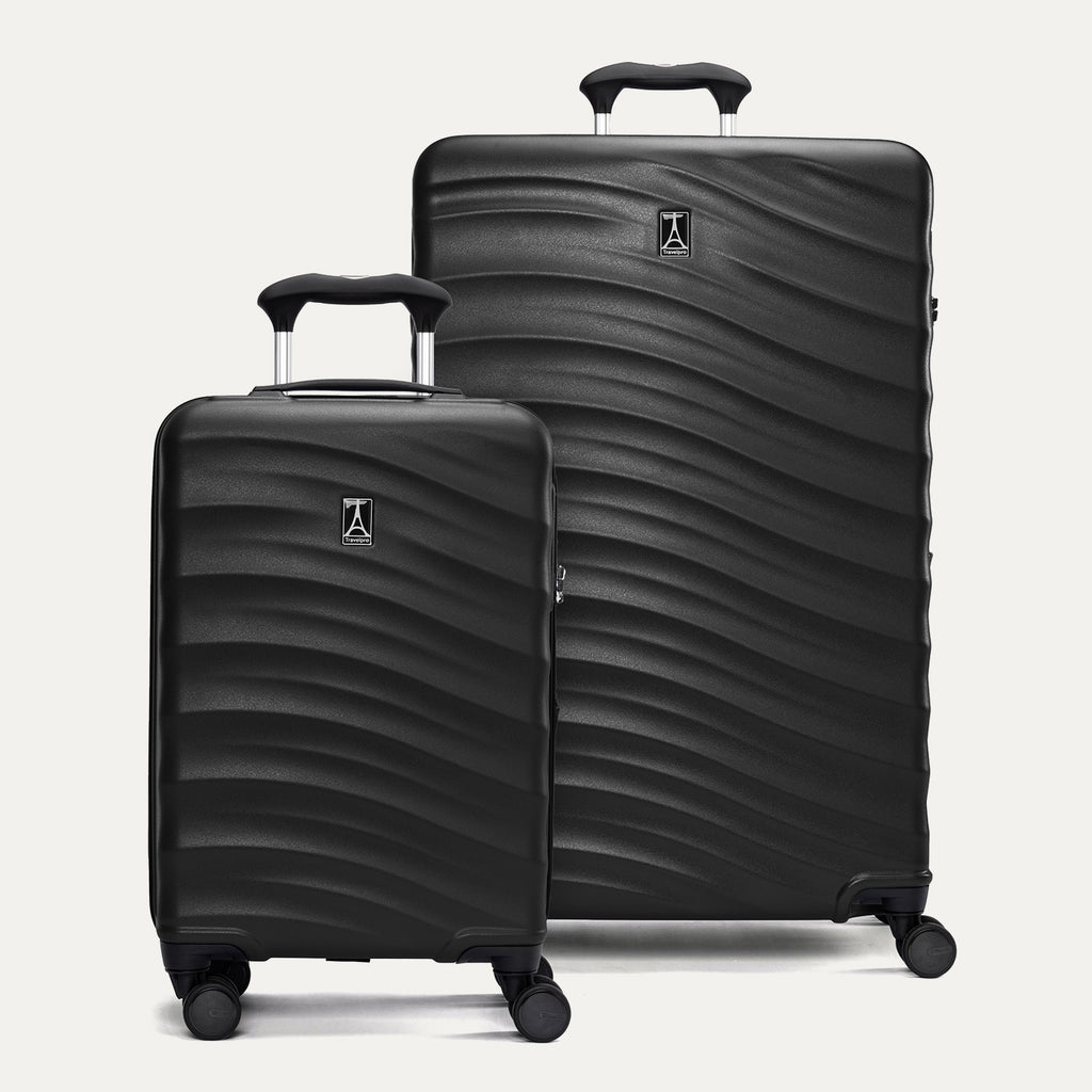 front view of the black travelpro maxlite air v2 set featuring the compact carry-on and large check-in hardside spinners with telescoping handles extended.