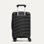 back view of the black travelpro maxlite air v2 hardside spinner showing the textured polycarbonate shell and the powerscope lite telescoping handle.