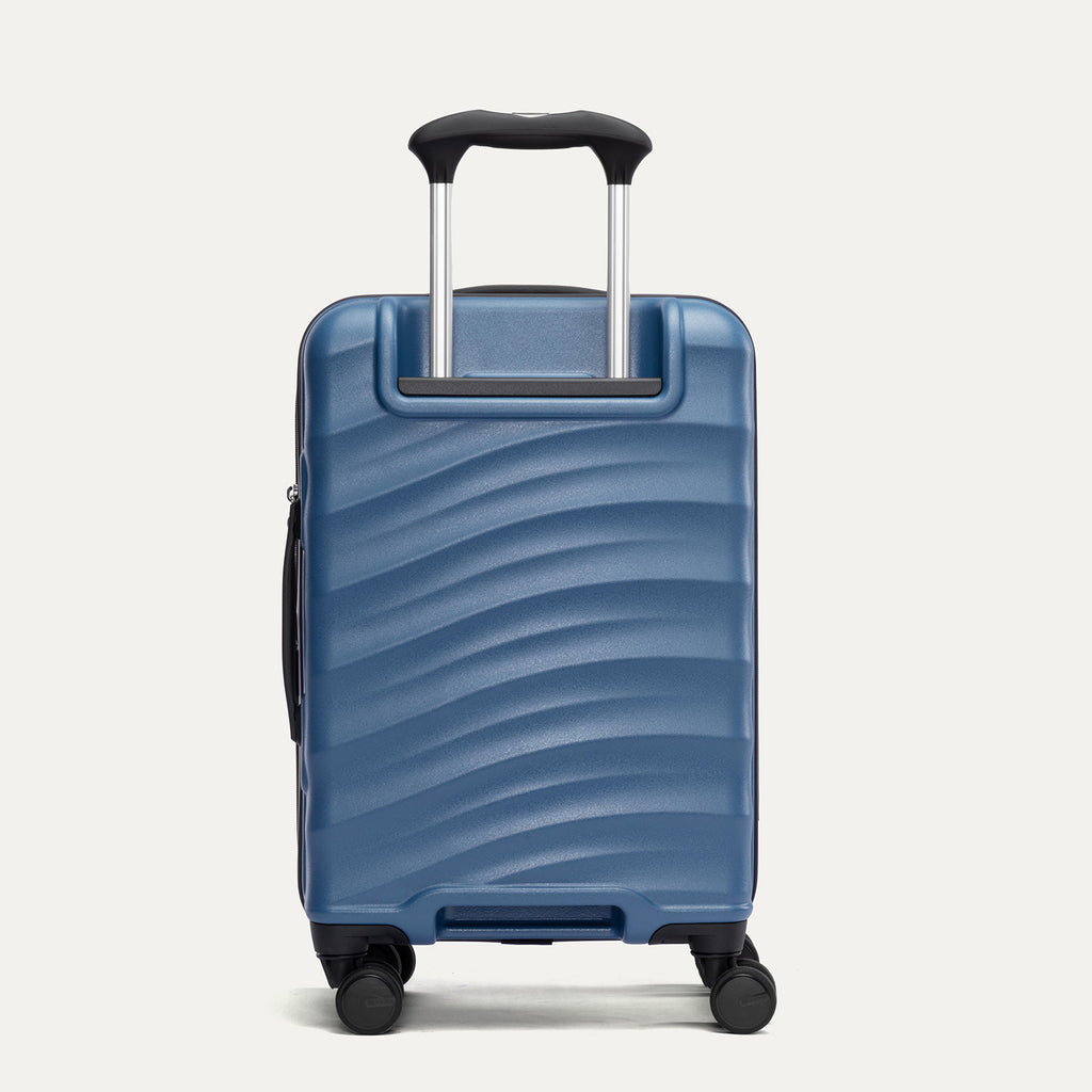 back view of the ensign blue travelpro maxlite air v2 hardside suitcase showing the textured polycarbonate shell and reinforced corner guards.