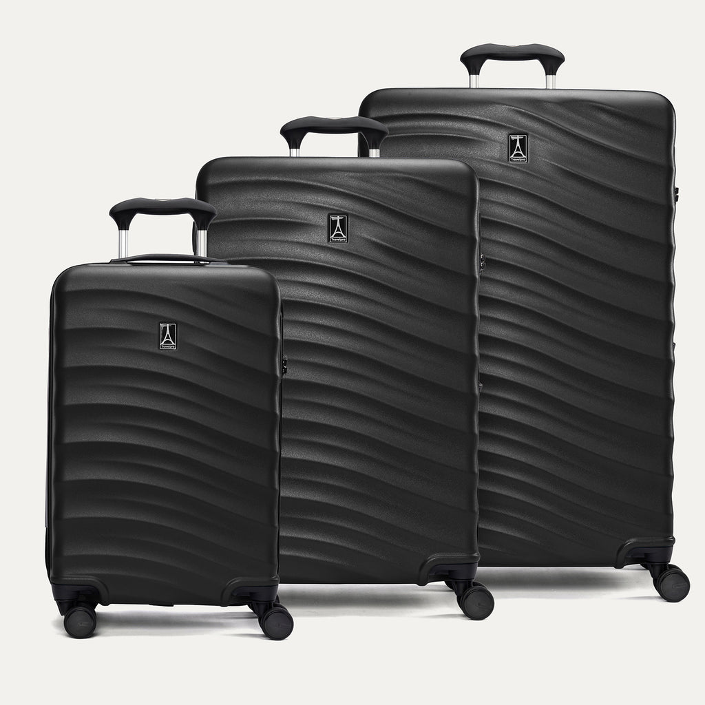 A set of three black Maxlite Air V2 hardside spinner suitcases, including carry-on, medium, and large sizes, aligned in a row with a textured surface on a white background