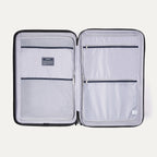 Interior view of Travelpro Maxlite Air V2  featuring zippered divider panels and mesh organizational compartments.