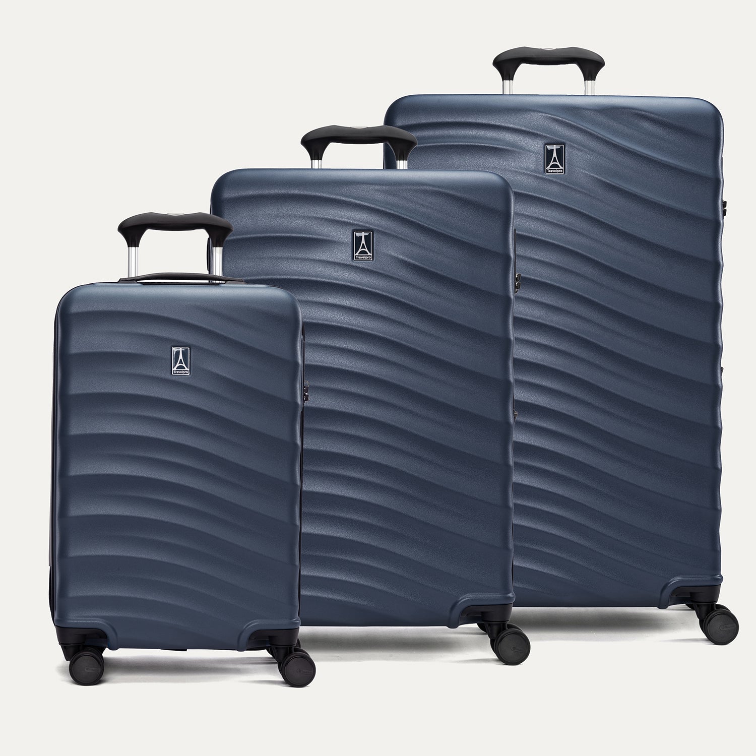 A set of three blue Maxlite Air V2 hardside spinner suitcases, including carry-on, medium, and large sizes on a white background