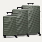 A set of three green Maxlite Air V2 hardside spinner suitcases, including carry-on, medium, and large sizes, with a textured surface and extended handle