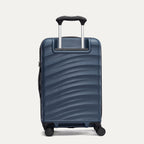 Rear view of Travelpro Maxlite Air V2 Expandable Spinner in Midnight Blue, featuring extended handle and ripple-textured shell.
