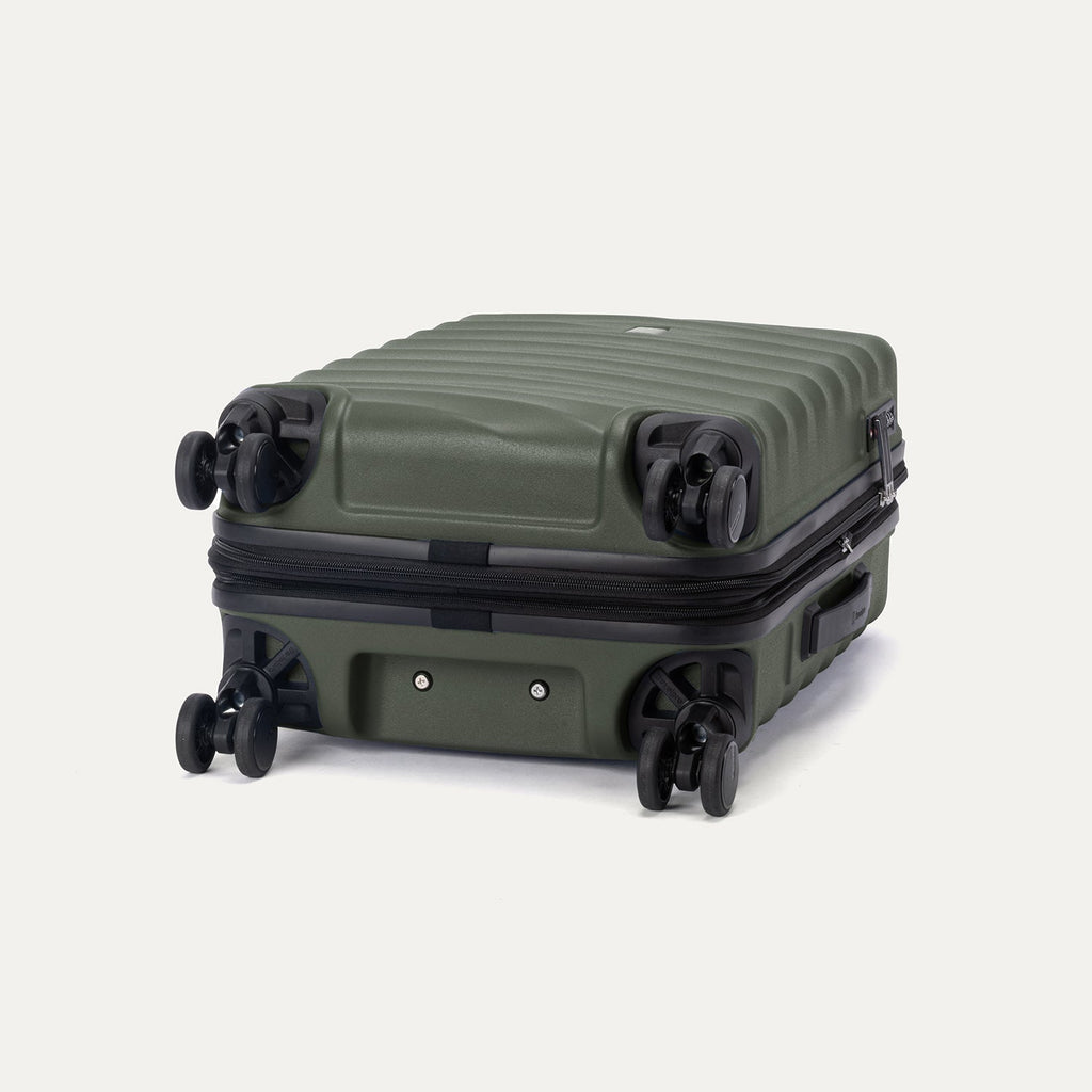 Travelpro Maxlite Air V2 Expandable Spinner in Slate Green, shown lying flat to display base and wheels.
