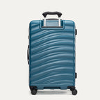 Rear view of Travelpro Maxlite Air V2 Spinner in Teal, showing textured shell and extended PowerScope Lite Handle.
