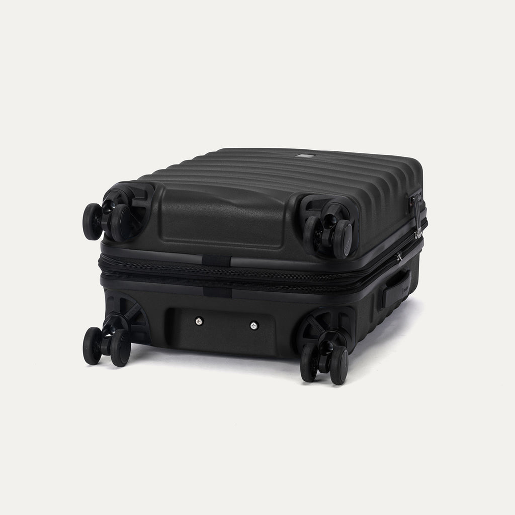 Bottom view of Travelpro Maxlite Air V2 Hardside Spinner in Black, featuring 360° Spinner Wheels and expandable zipper.