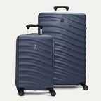 A set of two blue hardside spinner suitcases, one carry-on size and one large check-in size, with a textured surface, integrated handles, and wheels.