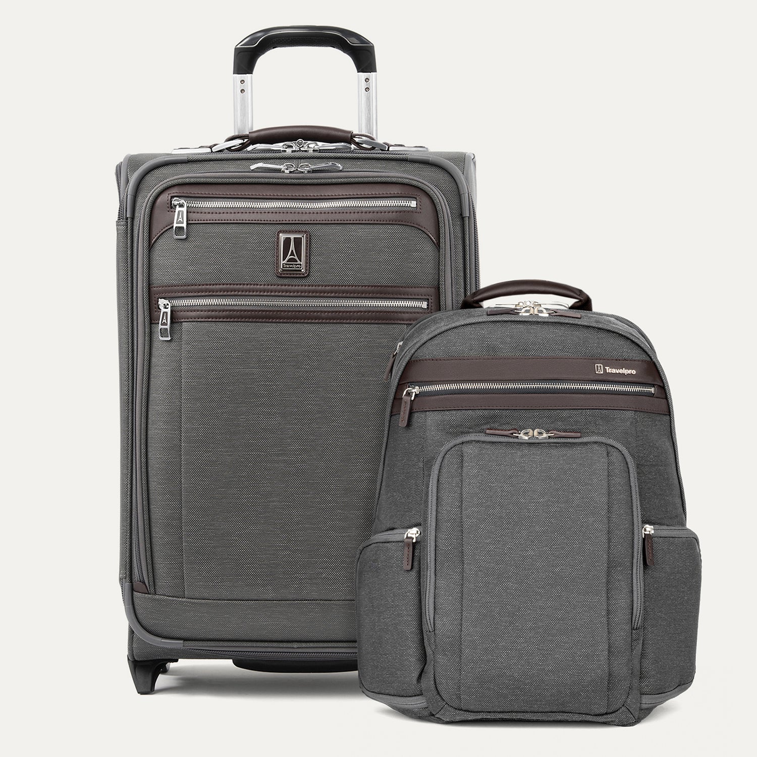 Gray suitcase and backpack set on a light gray background
