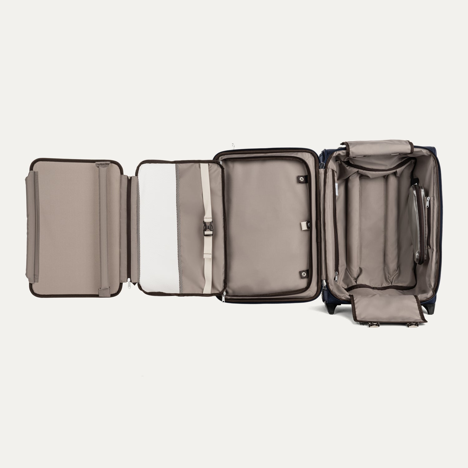 Open suitcase with interior compartments on a light beige background