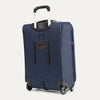 Back view showing USB port of Blue suitcase with wheels and handle on a light gray background