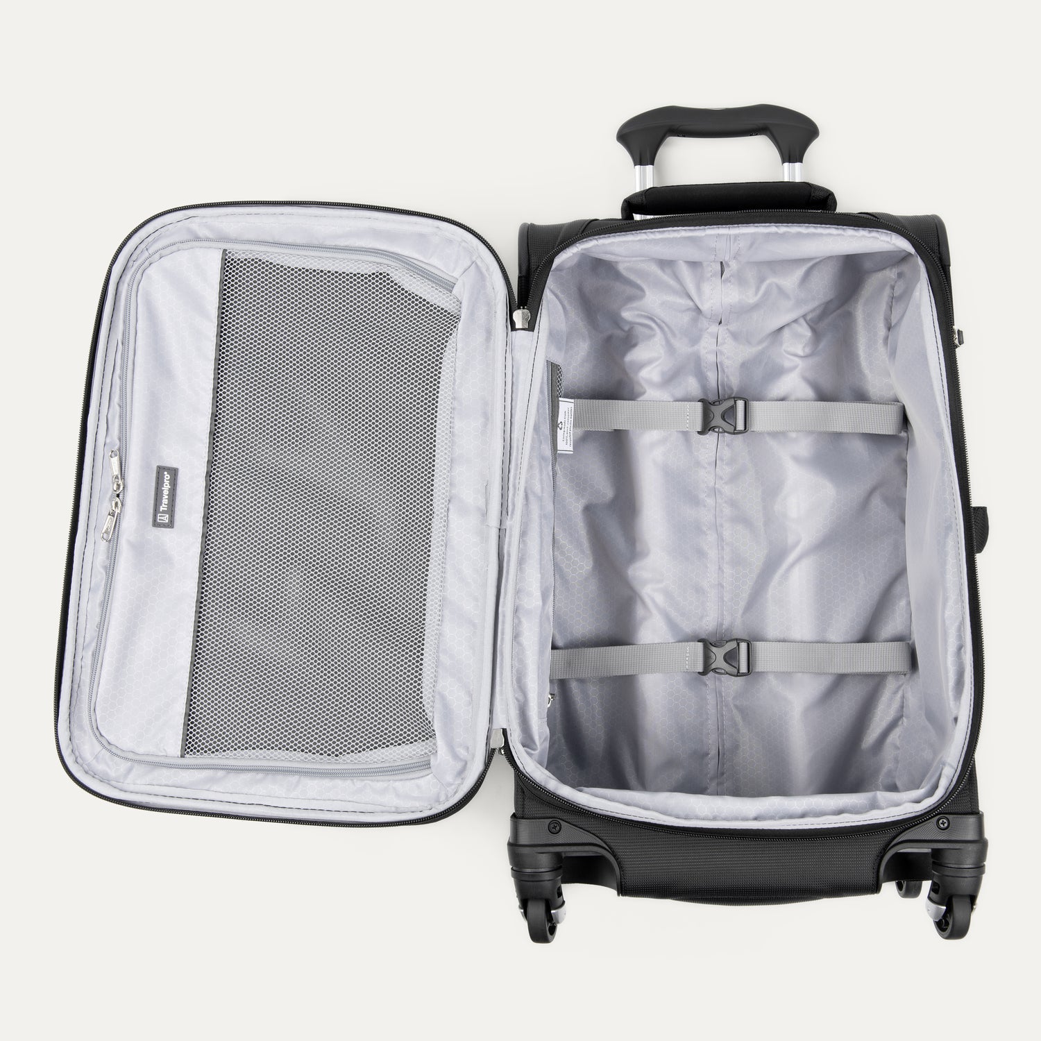 Open black suitcase with interior organization panels on a white background