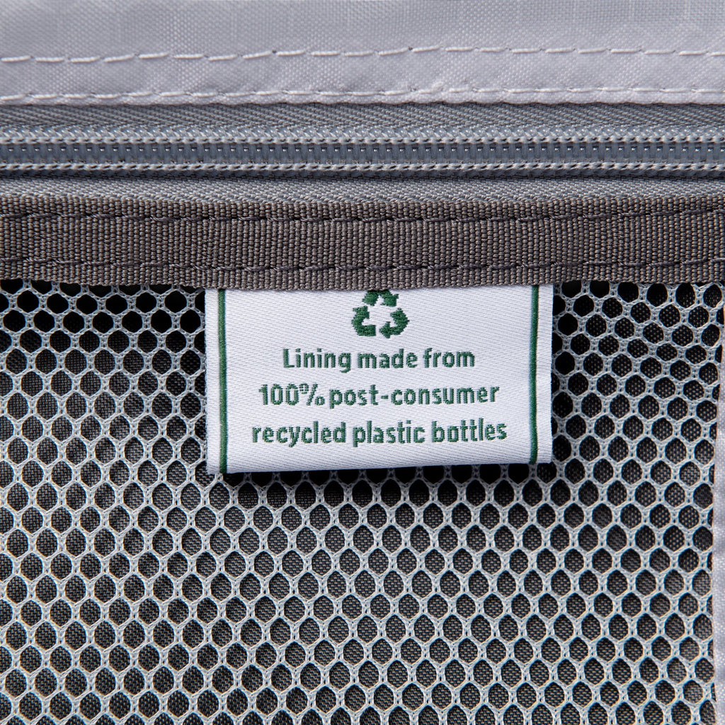 Label on a product indicating lining made from 100% post-consumer recycled plastic bottles.