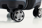 Close-up of a suitcase wheel on a white background