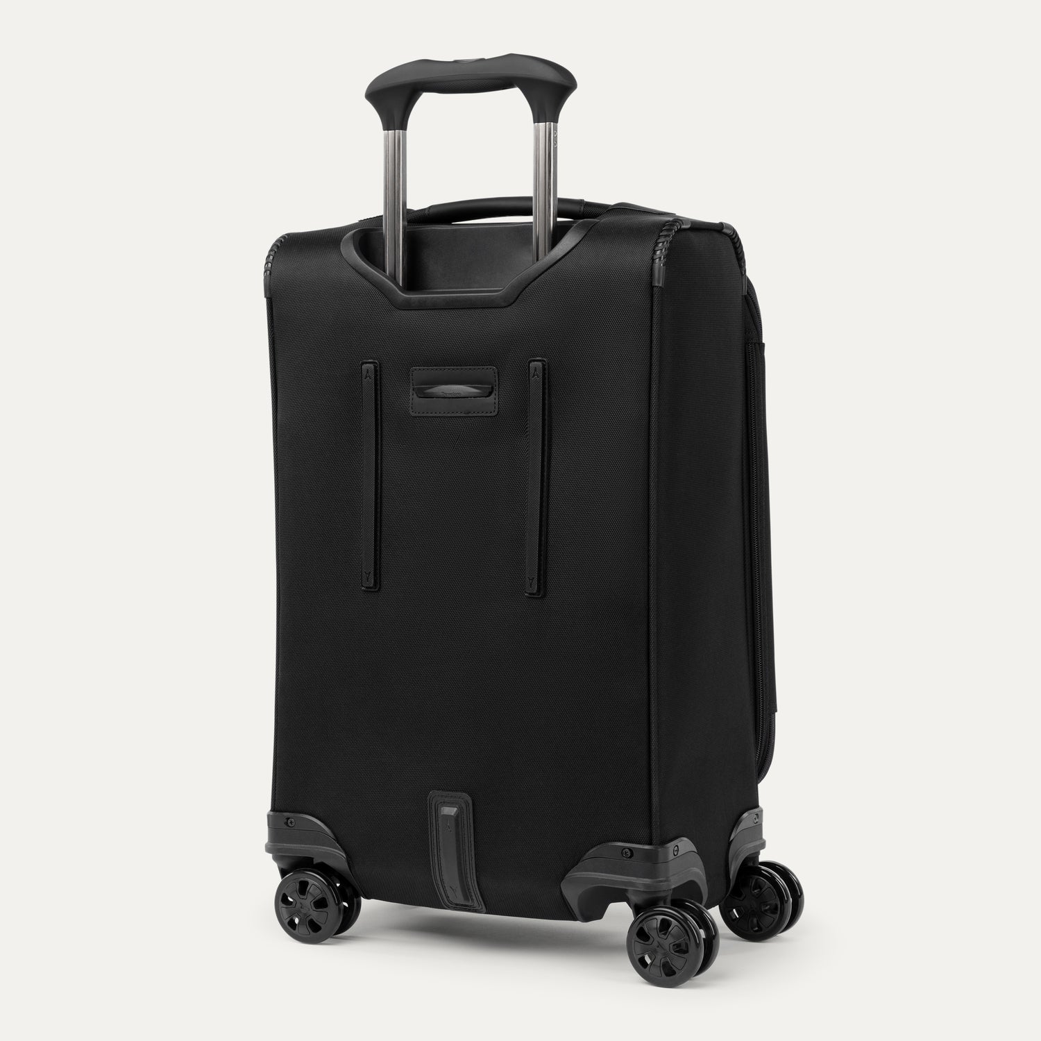 Black suitcase with wheels and handle on a light gray background