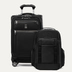 Black suitcase and backpack set on a white background
