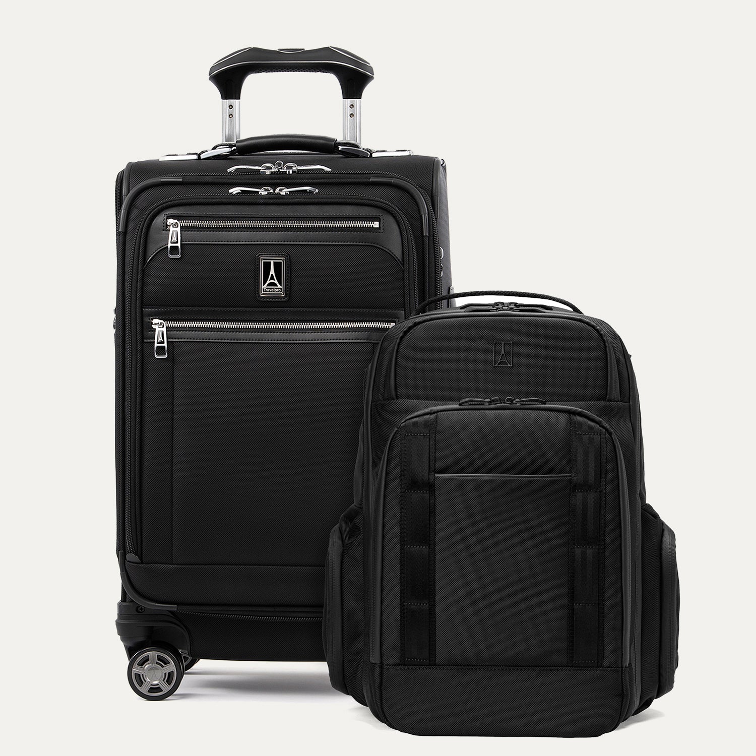 Black suitcase and backpack set on a white background