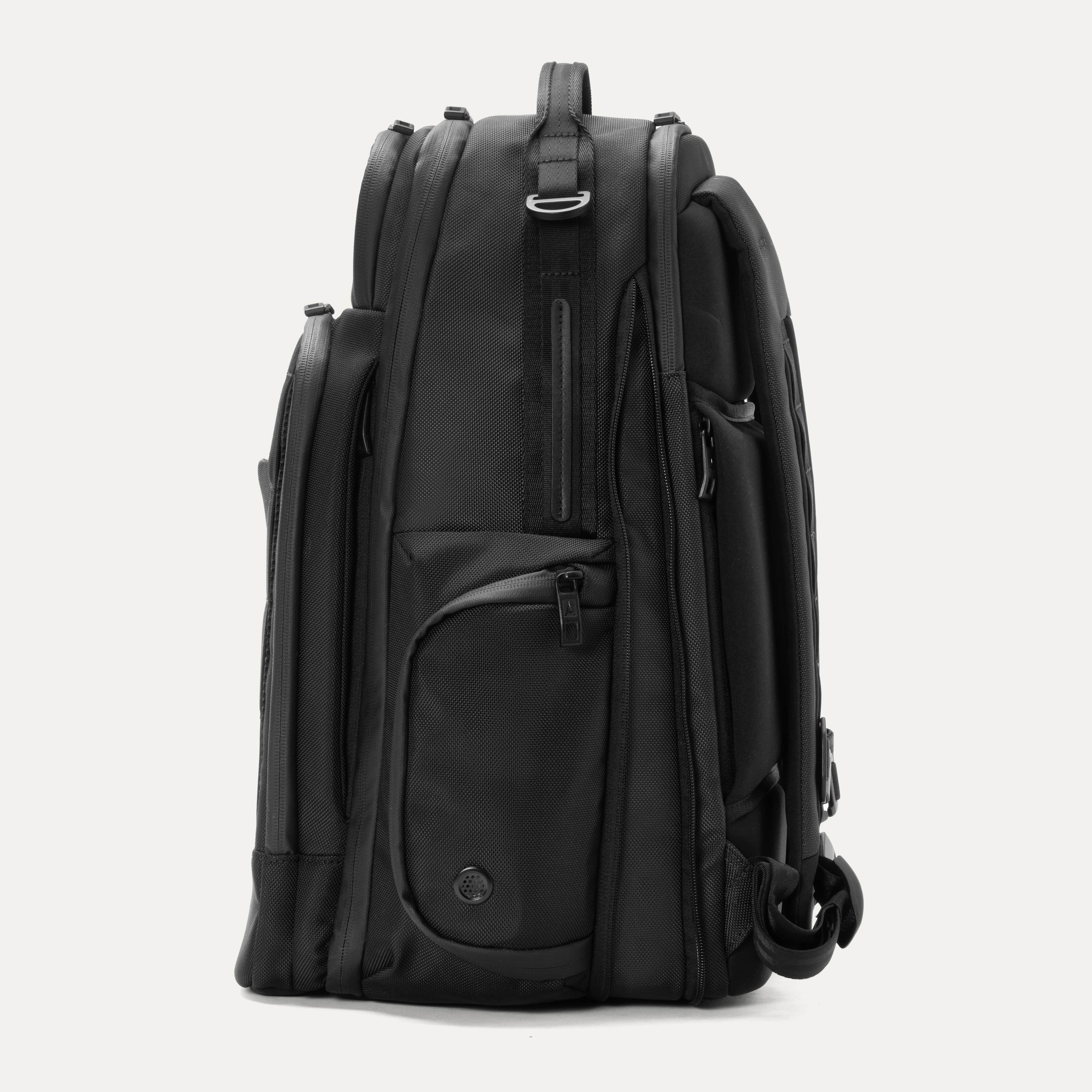 Side view of black backpack on a white background