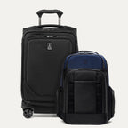 A set of two pieces of luggage, featuring a black carry-on spinner and a aviator navy laptop backpack, on a white background