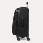 Side view of black suitcase with handle and wheels on a white a background 