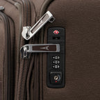 Close-up of a brown suitcase with zipper and lock.